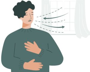 A person doing deep breathing exercises to reduce anxiety